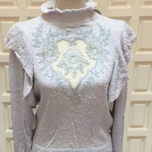 Light Grey Ruffled Sweater with Medallion Ribbon Detail Front, Size Large